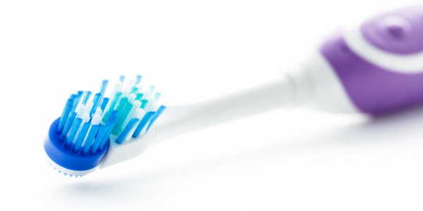 Electric toothbrush isolated on a white background